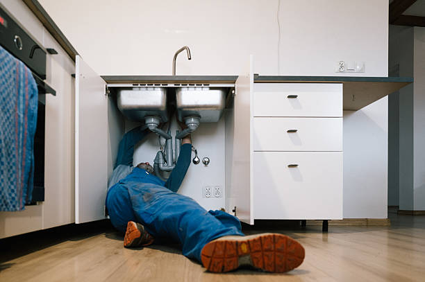 Professional Drain Cleaning technician working in Leland, IL